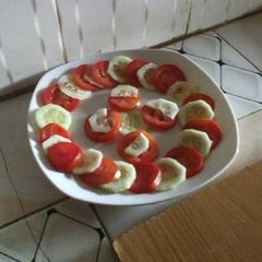 A picture of Cucumber tomato salad.
