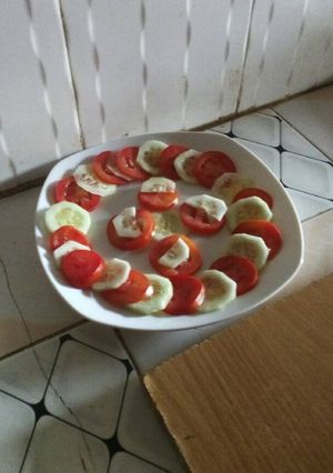 A picture of Cucumber tomato salad.
