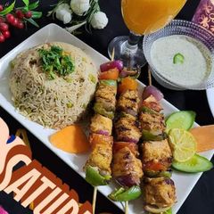 A picture of Tikka boti with matar pulao.