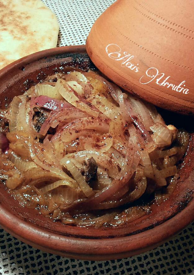 Una foto de Talline de pollo con cebollas