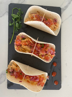 Una foto de Tacos cochinita pibil
