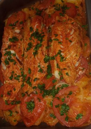 Una foto de Pescado al vino blanco