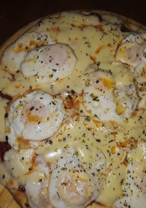 Una foto de Pizza De huevo Frito 🍳