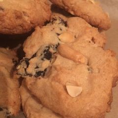 A picture of Peanut butter cookies with dried plums.
