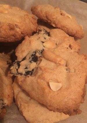 A picture of Peanut butter cookies with dried plums.
