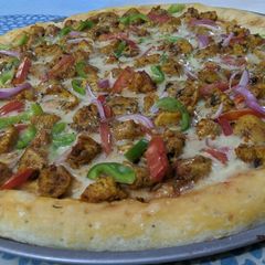 Chicken Tikka pizza A picture of Chicken Tikka pizza.