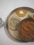 Mashed Aubergine Curry with Pearl Millet bread