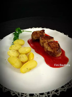 Una foto de Solomillo de cerdo con mermelada de tomate