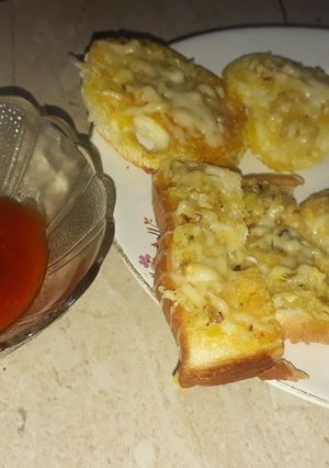 A picture of Garlic bread in different shapes.