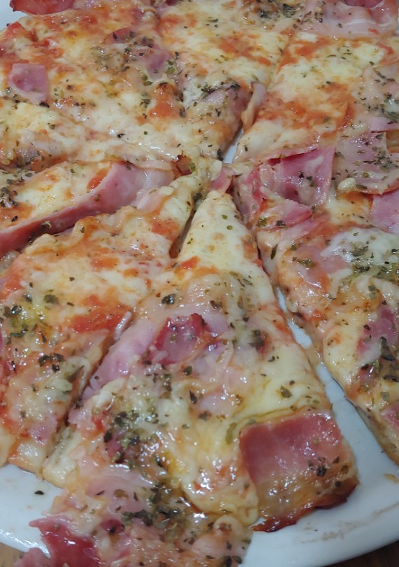 Una foto de Pizza 4 formagio amb beicom Fumat (ahumado)