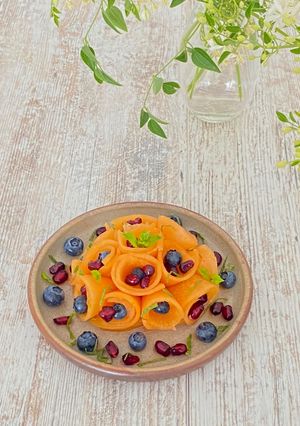 Une photo de Carpaccio de melon
