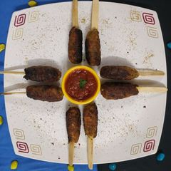A picture of Soyabean Kebab Stick Rolls.