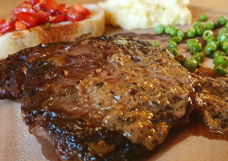 Rib-Eye Steak with creamy black pepper sauce and Mashed potato