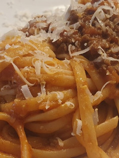 Una foto de Linguine a la bolognesa