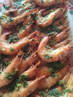 Una foto de Langostinos horneados al brandy