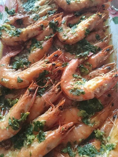 Una foto de Langostinos horneados al brandy