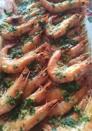Una foto de Langostinos horneados al brandy
