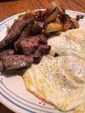 Steak and eggs with a side of home fries