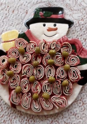 Una foto de Serpentinas de jamón y queso