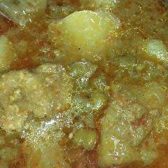 A picture of Potato and green chhole ki veg.