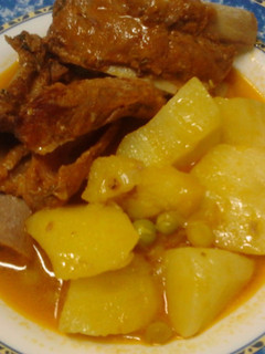 Una foto de Costilla de cerdo adobada en salsa