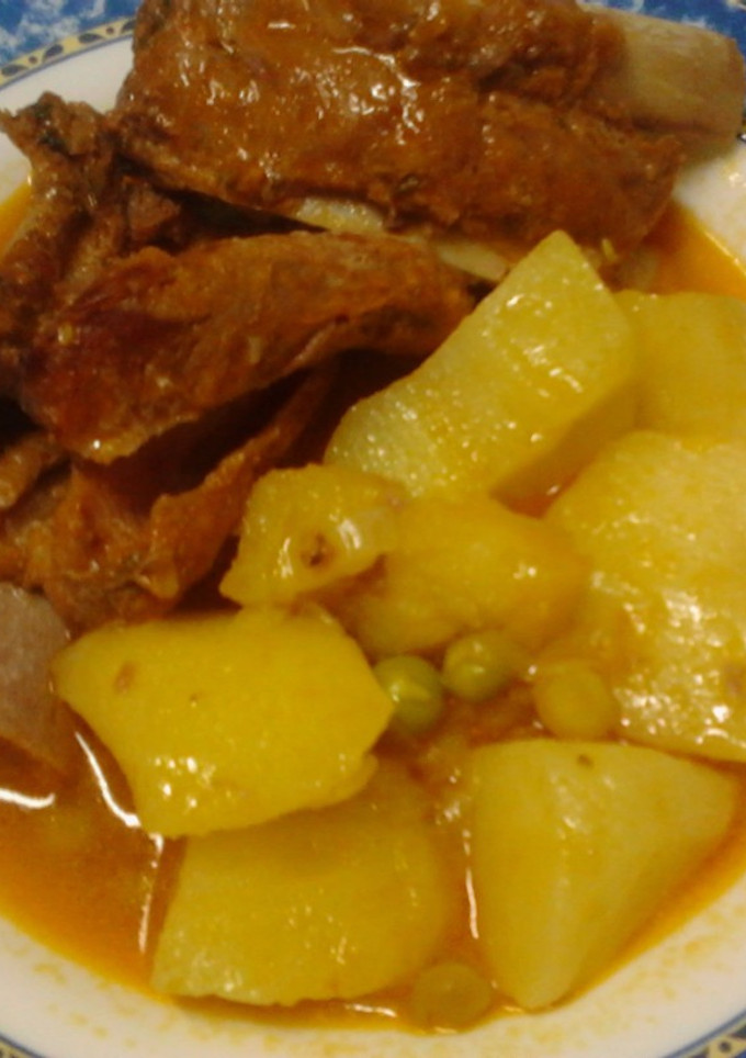 Una foto de Costilla de cerdo adobada en salsa