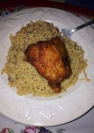 A picture of Plain Indomie with Sweet Fried Chicken.