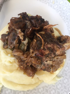 Una foto de Lomo de cerdo relleno con champiñones