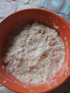 A picture of Oat with groundnut and milk.