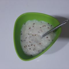 A picture of Simple dahi rice loaded with jeera.