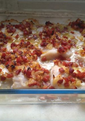 Una foto de Merluza al horno con Jamón