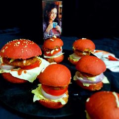 A picture of Whole wheat mini beatroot burger bun.
