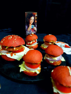 A picture of Whole wheat mini beatroot burger bun.