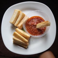 A picture of Fried Yam and Peppered Stew a. k. a dundun.