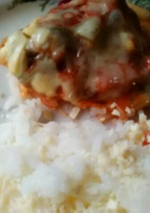 Una foto de Pollo a la pizza