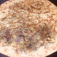 A picture of Alu meethy wala paratha.