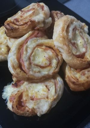 Una foto de Enrolladitos de pizza
