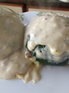 Una foto de Zapallitos rellenos + salsa blanca