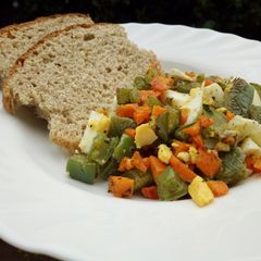 Nopal cactus salad with boiled egg..and whole wheat bread A picture of Nopal cactus salad with boiled egg..and whole wheat bread.