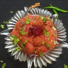 A picture of Baby cabbage with beetroot gravy.