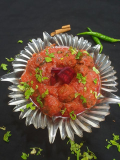A picture of Baby cabbage with beetroot gravy.