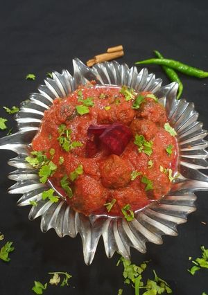 A picture of Baby cabbage with beetroot gravy.
