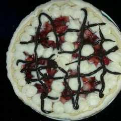 A picture of Tarta dulce de frutilla.