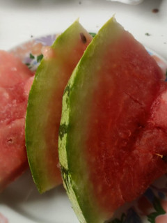 A picture of Water melon fruit slice.