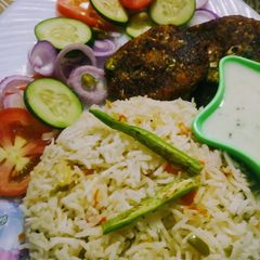 A picture of Healthy platter(veg kabab and veg rice with raita).