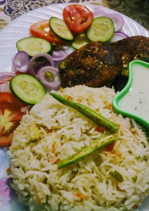 A picture of Healthy platter(veg kabab and veg rice with raita).