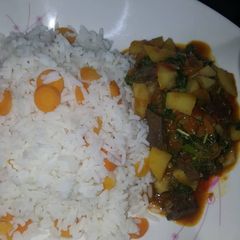 White rice and liver sauce A picture of White rice and liver sauce.