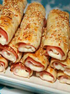 Una foto de Hojaldres de jamón y queso