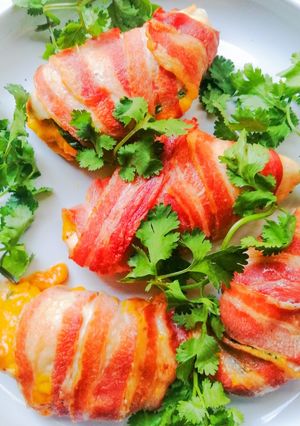 A picture of Bacon wrapped stuffed chicken breasts.