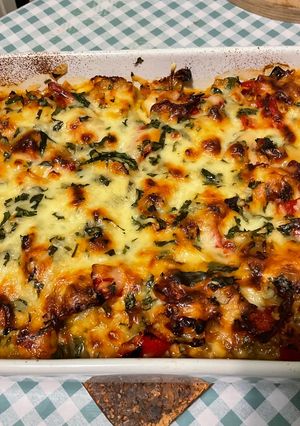 A picture of Endive Gratin with Red Bell Peppers, Ham, Honey, and Curry.